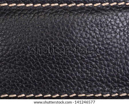 Leather texture colose-up with linear stiches