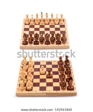 Set of a wooden chess pieces on a chess board isolated on a white background