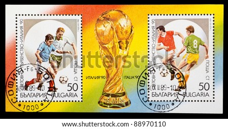 BULGARIA - CIRCA 1990: a stamp printed by Bulgaria shows football players. World football cup in Italy, series, circa 1990