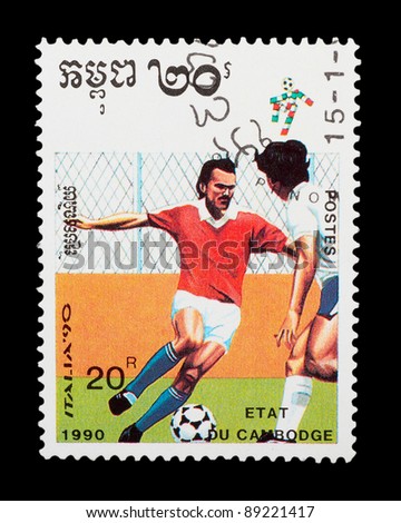 CAMBODIA - CIRCA 1990: a stamp printed by Cambodia shows football players. World football cup in Italy, series, circa 1990