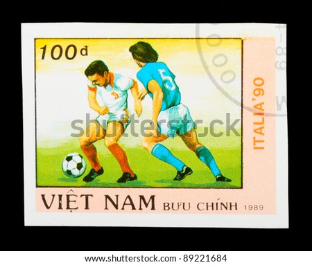 VIETNAM - CIRCA 1989: a stamp printed by VIETNAM shows football players. World football cup in Italy, series, circa 1989