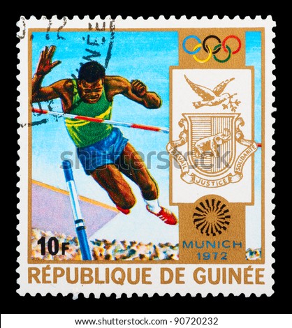 GUINEA - CIRCA 1972: A stamp printed in GUINEA shows high jump, series Olympic games in Munich, circa 1972