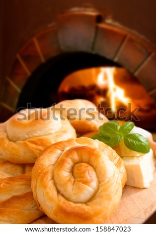 Bakery background - cheese pie on fireplace background