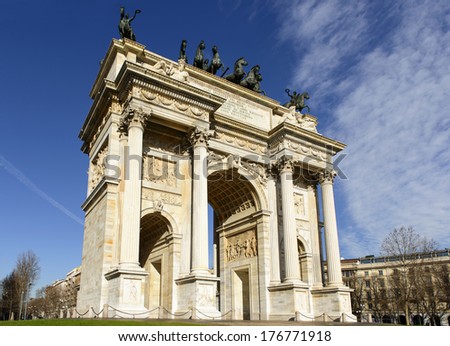 Arco della Pace view, Milan; view of marble monument  originally built to celebrate the arrival of Napoleon in town in 1807, shot  in bright winter light
