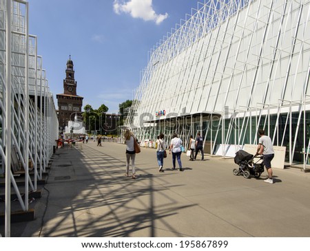 MILAN, ITALY - MAY 30:  the building site of EXPO 2015  tourist information center  near Castello Sforzesco, almost finished, in background the Castle tower, shot  on may 30 2014,  Milan, Italy