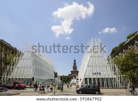 MILAN, ITALY -MAY 30: view of the building site of EXPO 2015  tourist information center  near Castello Sforzesco, almost finished, in background the Castle tower, shot  on may 30 2014,  Milan, Italy