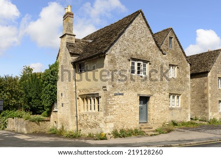 old stone cottage, Lacock medieval stone cottage, prospecting on a street in historic touristic village of  Wiltshire