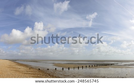 low tide on beach at New Romney, view, at low tide time, of the sea and the shingle beach at New Romney, Kent