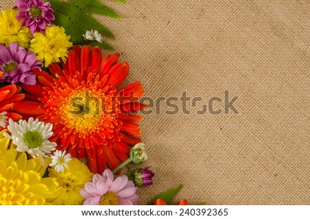 Image of full color flowers on brown sack  background