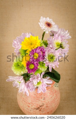 Image of flowers on brown sack  background