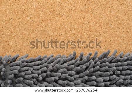 Texture image of fabric doormat with cork background