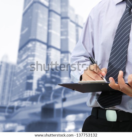 Businessman Signing A Document
