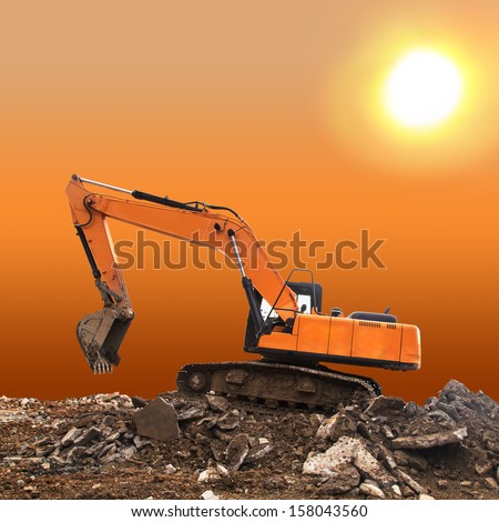Excavator at sunset