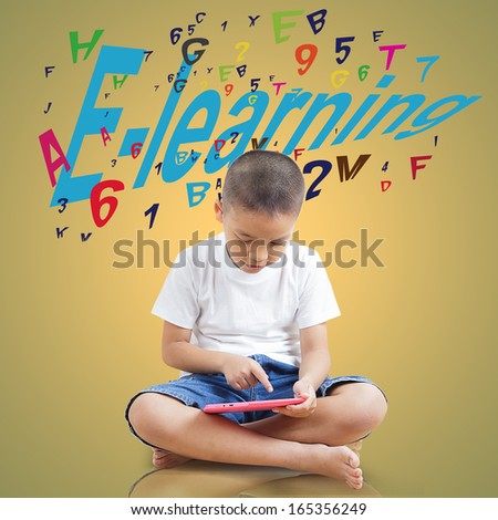 Boy using digital tablet, The concept of E-learning