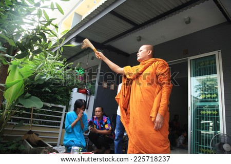 BANGKOK, THAILAND - OCTOBER 12: Buddhist monk praying, Thailand on October 12, 2014, buddhist monks praying for to a housewarming in Bangkok, Thailand