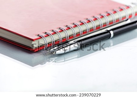 Red Notebook on white background