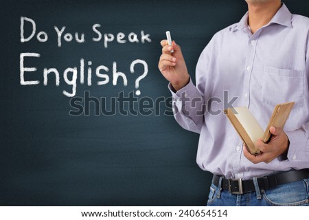 Teacher in classroom, Blackboard education concept saying Do You Speak English?