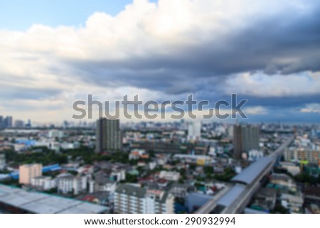 Background with blurred aerial view with skyline and blue sky
