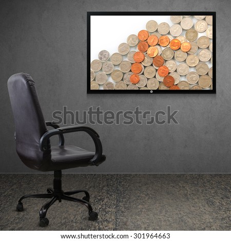 Office chair and TV screen with money arrow the growth of money