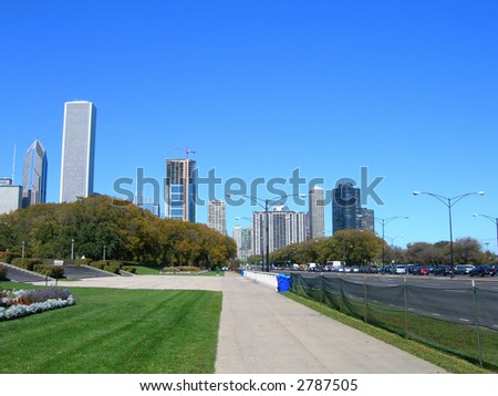 Chicago Downtown Skyline from across street, with a perspective of sidewalk  vanishing point.
