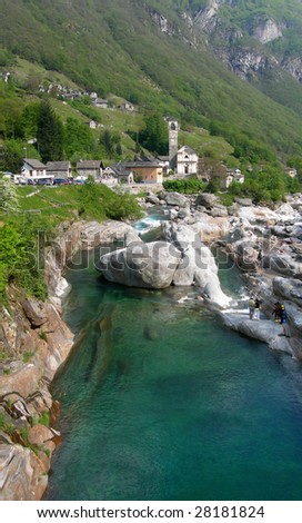 Mountain stream in village in the Swiss Alps, in Verzasca valley, Southern Switzerland
