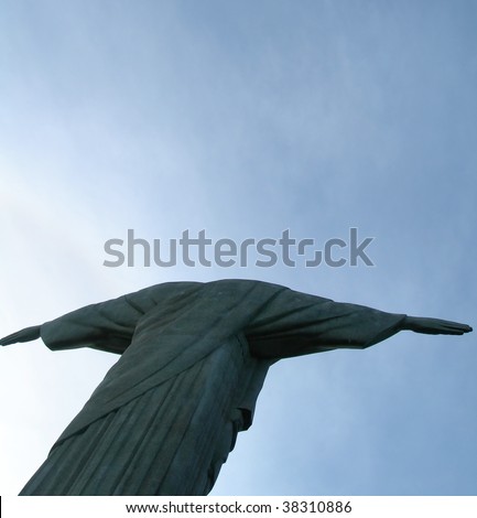 Unusual angle of the Statue of Christ the Redeemer on the Corcovado mountain in Rio de Janeiro, Brazil, South America