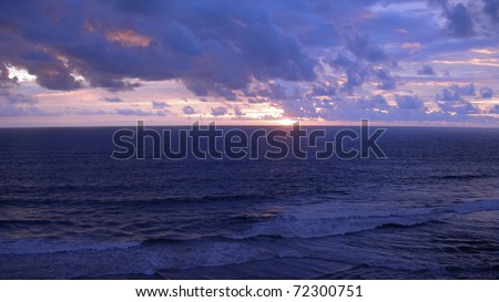 Purple sunset on the Indian Ocean in Kerala, Southwest India