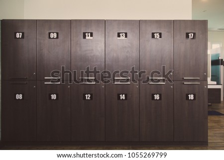 Vintage wooden locker room or dressing room in gym