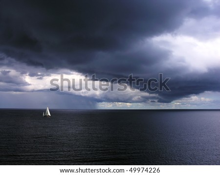 Alone white little yacht in sea with storm weather
