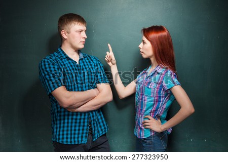 Hard times in relationship. Angry wife, girlfriend trying to explain something to annoyed husband, boyfriend. Marriage problems. Negative emotions.