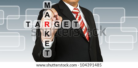 Businessman hand drawing target market