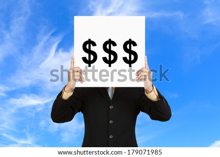 Businessman hold board with money sign on blue sky background