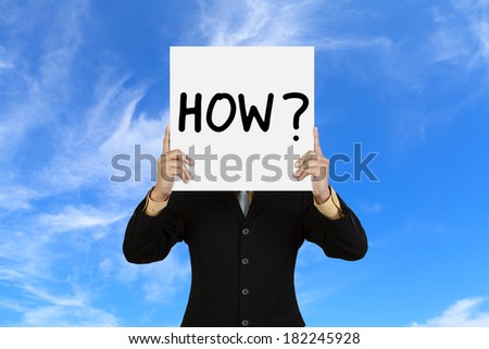 Businessman with word How on blue sky background