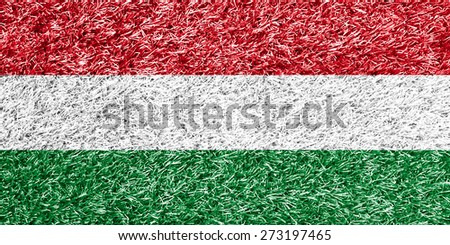 Hungary flag on grass background texture