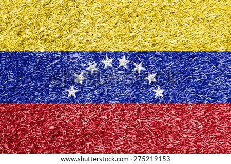 Venezuela flag on grass background texture