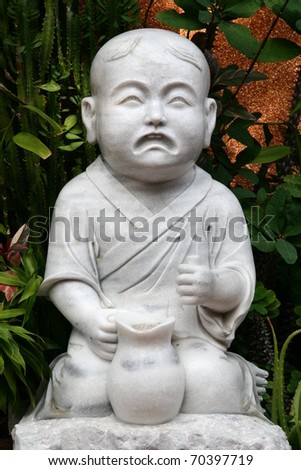 Marble crying boy sitting with his pot