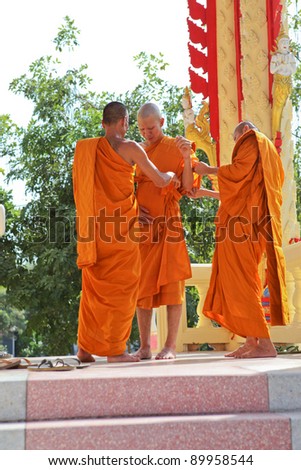 LOPBURI - NOVEMBER 19. Newly ordained Buddhist monk has a ritual in the temple procession in Thailand on November 19, 2011 in Lopburi. Monk ordinations in Thailand are very important social events.