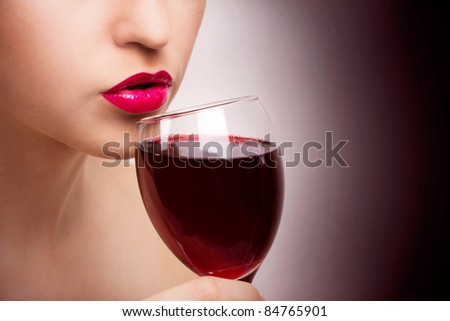 young beautiful woman with wine, close-up