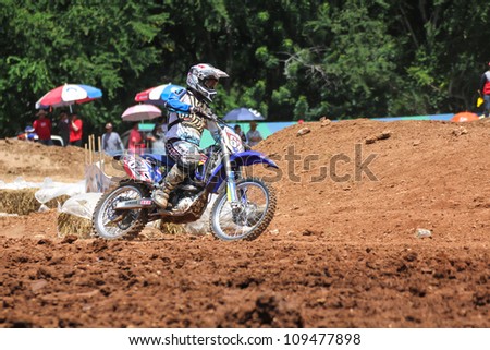 MUAKLEK, THAILAND - AUGUST 05: Unidentified rider participates in  competition Supercross Championship of Thailand, on August 05, 2012 in Muaklek, Saraburi,Thailand
