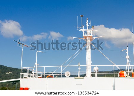 Navigation system  and Ships antenna in a clear blue sky