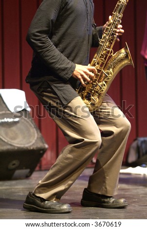 Playing sax during a live jazz session