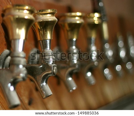 Row Of Dusty Old Beer Taps In An Abandoned Bar