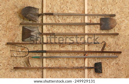 New tool shed with horizontally placed vintage tools
