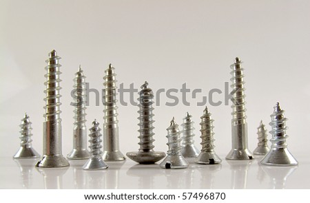 Various screws on end point upward to resemble a cityscape skyline