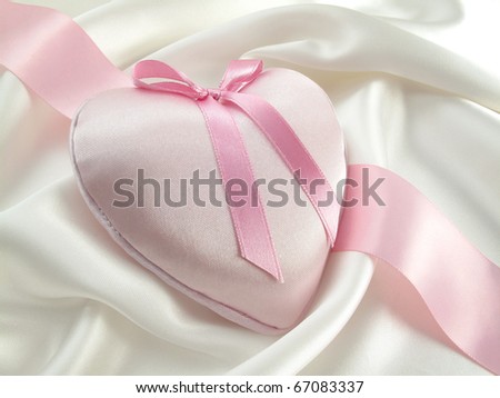 Pretty pink pillow heart on satin...look for more great valentine ideas in my portfolio!