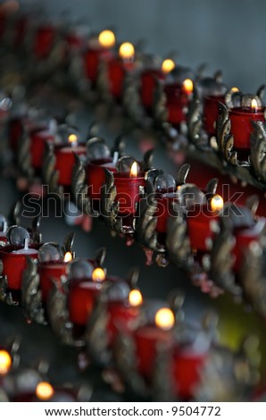 Votive candles at the church altar