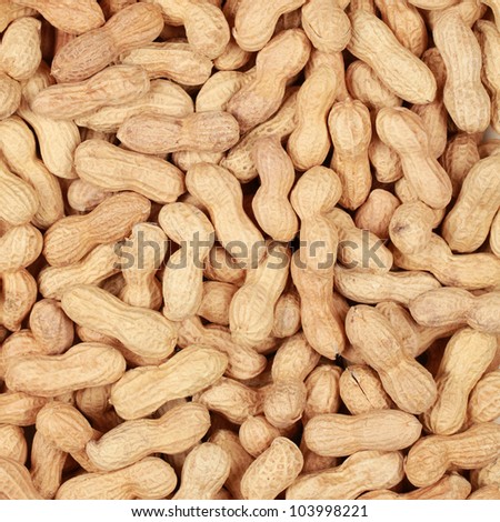 Many peanuts in shells, one upon the other