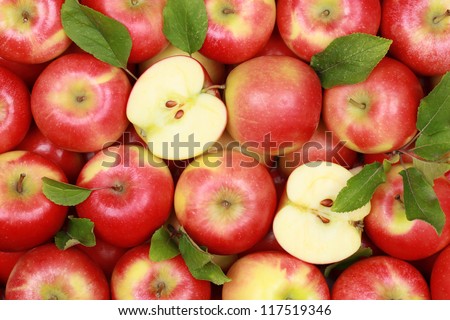 Group Of Red Apples With Their Leaves