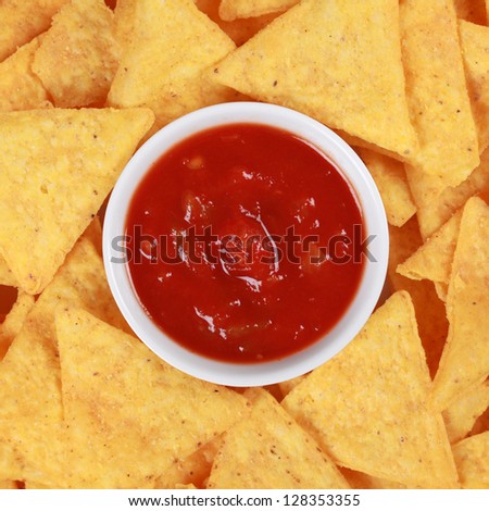 Collection of Mexican Tortilla chips served with a salsa sauce