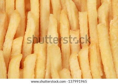 French fries forming a fast food background